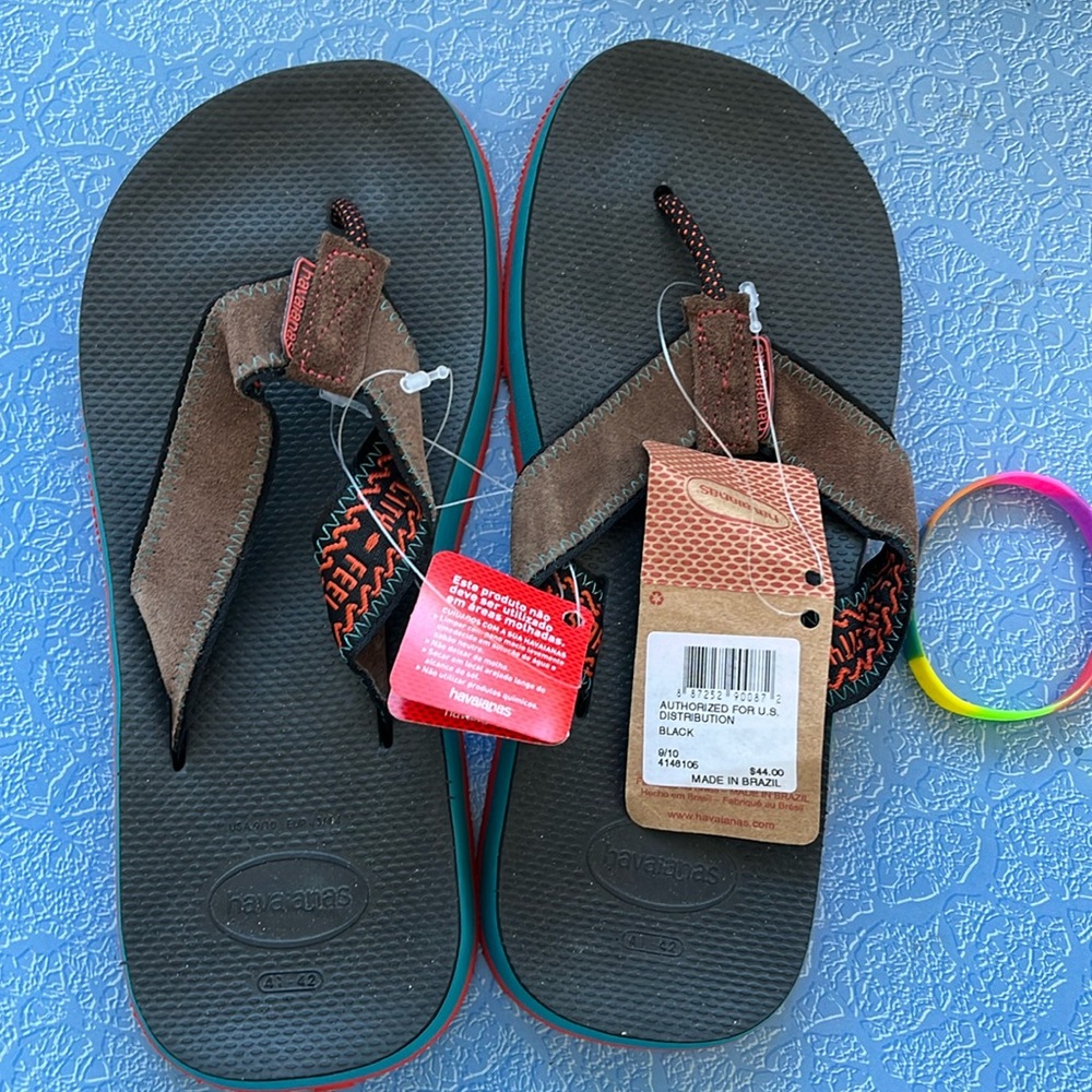 Never worn flip flops by Havaianas, NWT size 9/10 (41-42), made in Brazil